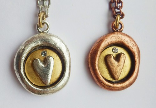 ME heart seal pendants